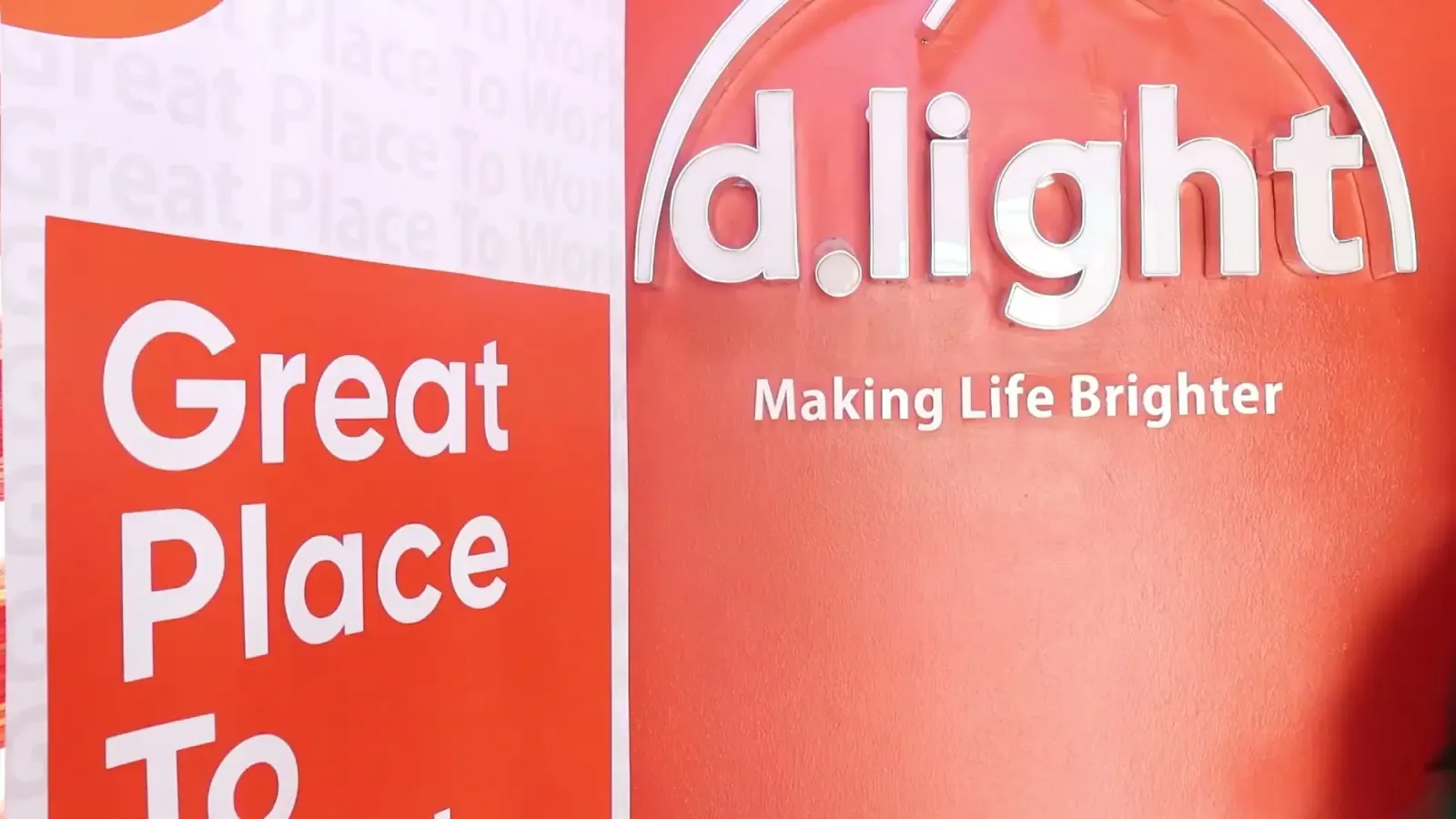 A d.light backdrop; a frame from the opening message.