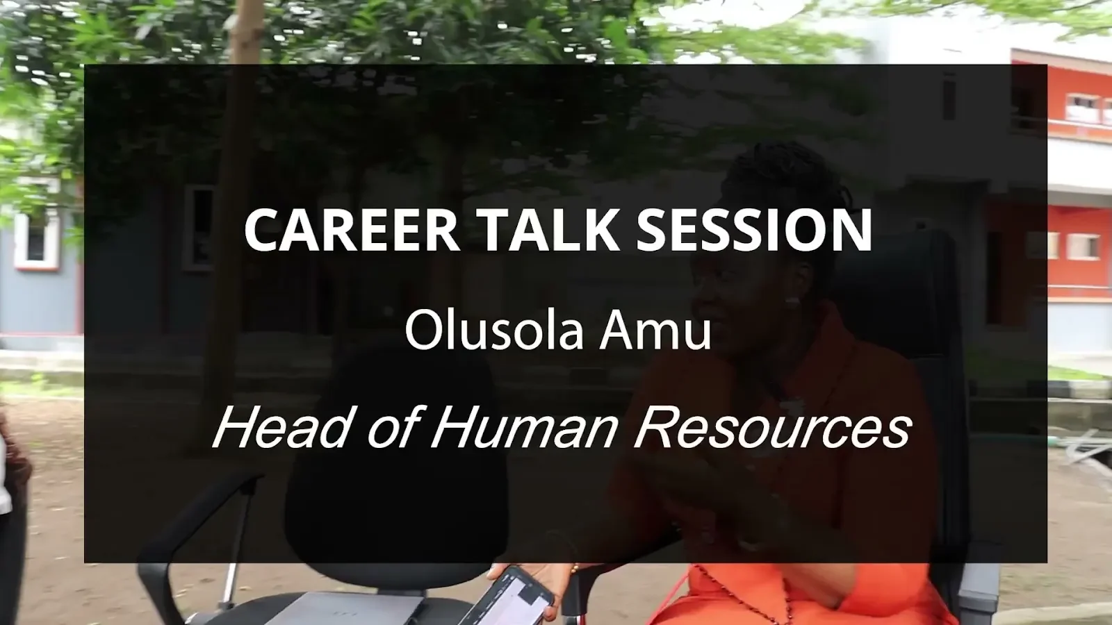 The career talk title appears over two colleagues seated outdoors; a frame from Growing together.