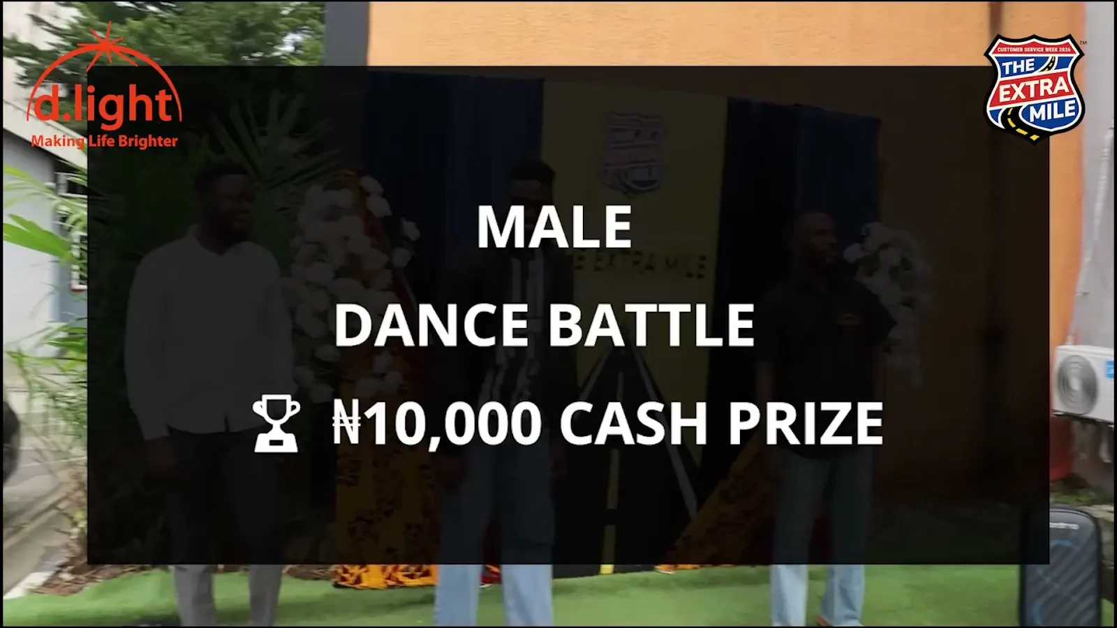 The men’s dance battle title appears over colleagues outside the office; a frame from More from the dance session.